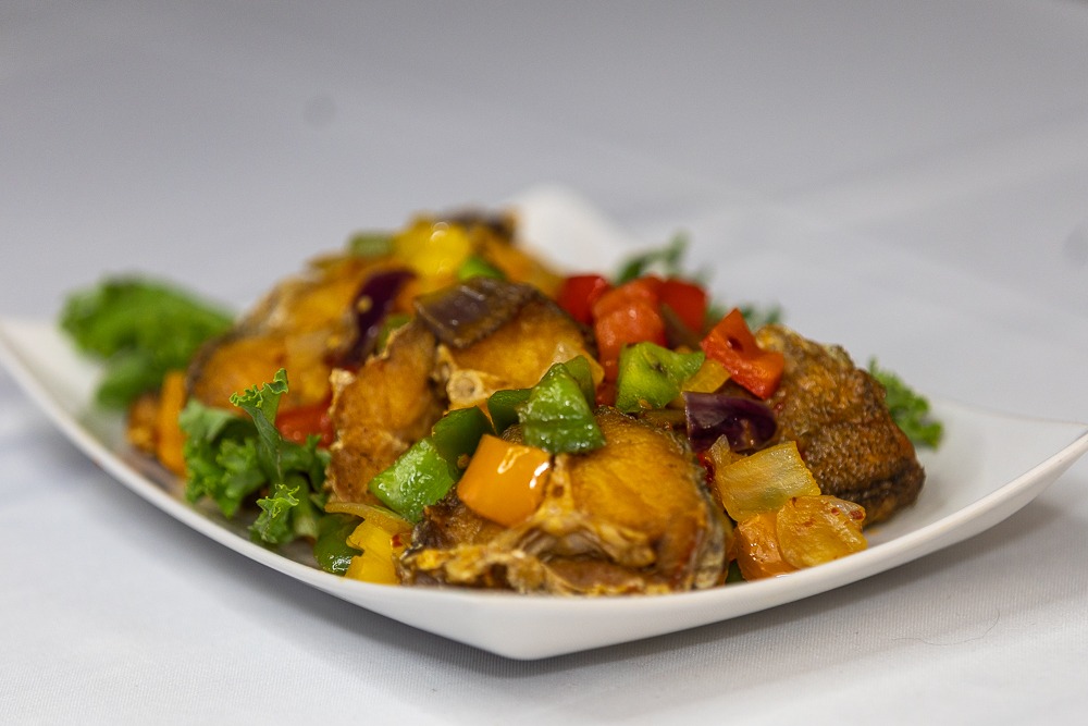Escovitch fish with colourful bell peppers — perfect BBQ dish